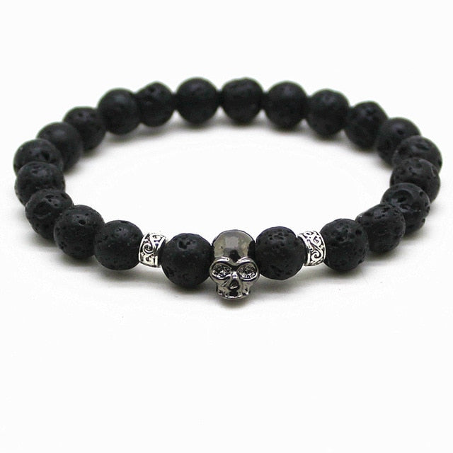 Unisex natural lava stone bracelet. Skull pattern